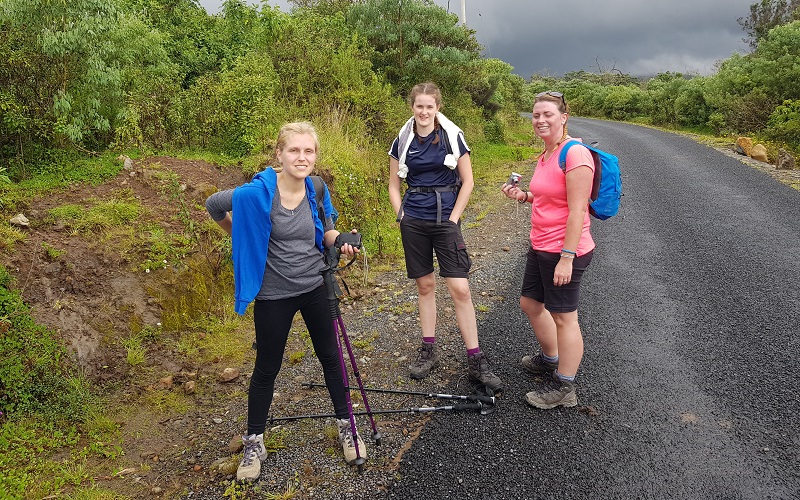 Emma, Jenny, and Amanda at the start of their climb up Mount Kenya to raise money for Porridge and Rice
