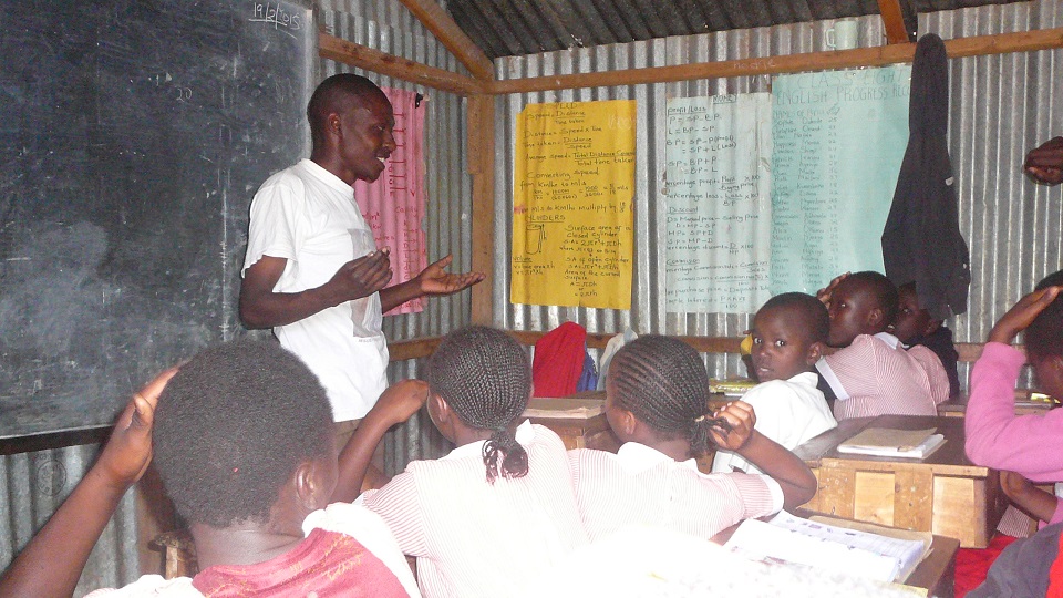 teacher Andrew conducts a maths lesson for his class