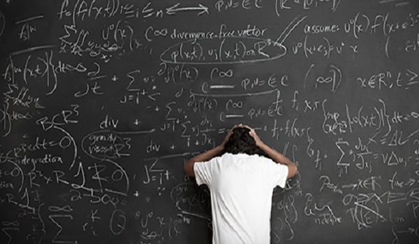 a child writes on a blackboard, KS Learning uses whiteboards